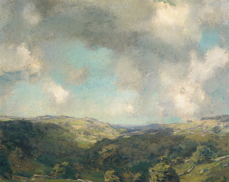 Puffy clouds drift over a sunlit hillside, dappled by shadows, invoking the spirit of a warm and breezy summertime.